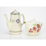 A George Jones Crescent China Art Deco coffee pot, decorated with stylised mauve petal flower with