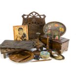 A collection of treen carved items, including a wall mounted German chip carved magazine rack with