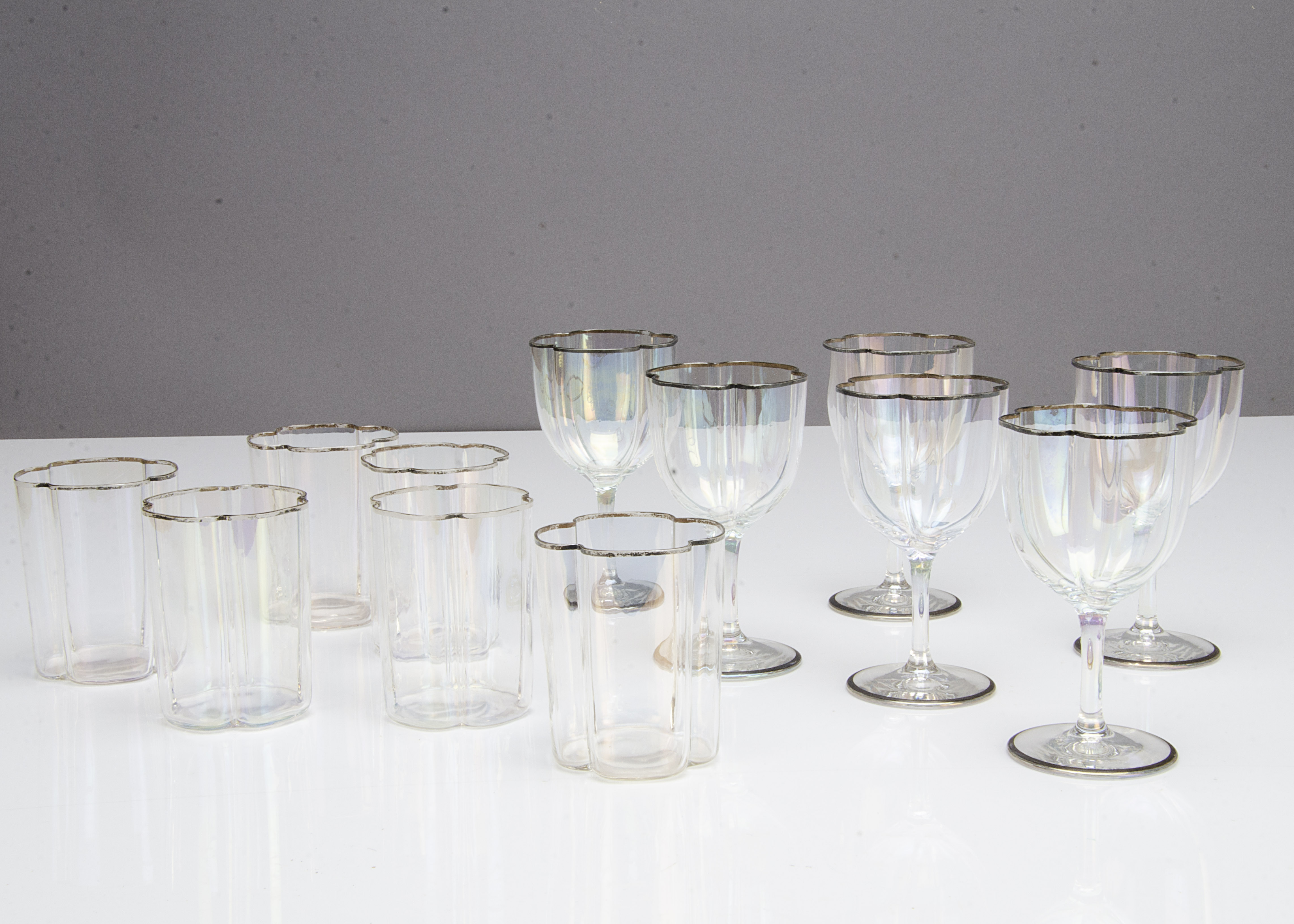 A part suite of early 20th Century iridescent glassware, the quatrefoil shaped glasses comprising - Image 2 of 2