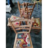 A set of four continental stained beech single dining chairs, with shaped back rails, carved crown