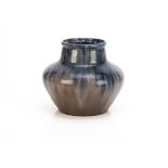 A Richard Mutz German stoneware 20th Century vase, the squat bulbous supporting a tapering neck