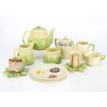 A three piece Staffordshire Art Deco teaset, with moulded primrose decoration, also in the lot two