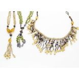 A continental multi gem set fringe necklace, with citrines, amethysts, garnets and white metal