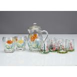 An Art Deco painted water jug set, comprising a pair of tumblers with floral decoration, 8cm high,