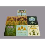 Seven T R Boote relief moulded Art Nouveau tiles, including a pair of stylised lily examples,