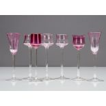 A set of four German Art Nouveau tulip liquor glasses with pink bowls and colourless stems, 15cm