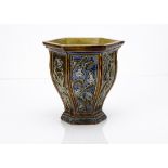 A British Arts and Crafts stoneware jardinière, of hexagonal tapered form, each panel decorated with