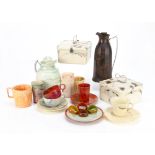 A collection of Bakelite and Bandalasta ware, including two Bakelite thermos flasks, one of