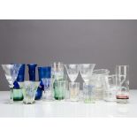 A collection of miscellaneous drinking glasses, some with engraved bowls, various contemporary glass