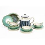 A terracotta tin glazed Danish blue and white teapot, the circular form teapot with waisted body,