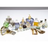 A collection of early 20th Century and later miniature perfume bottles, including a flattened