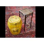 A hardwood occasional table with square top, pierced border on stylised bamboo supports, 25cm square