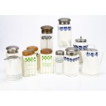 A set of three German Jugendstil ceramic kitchen storage jars, of square moulded design, with