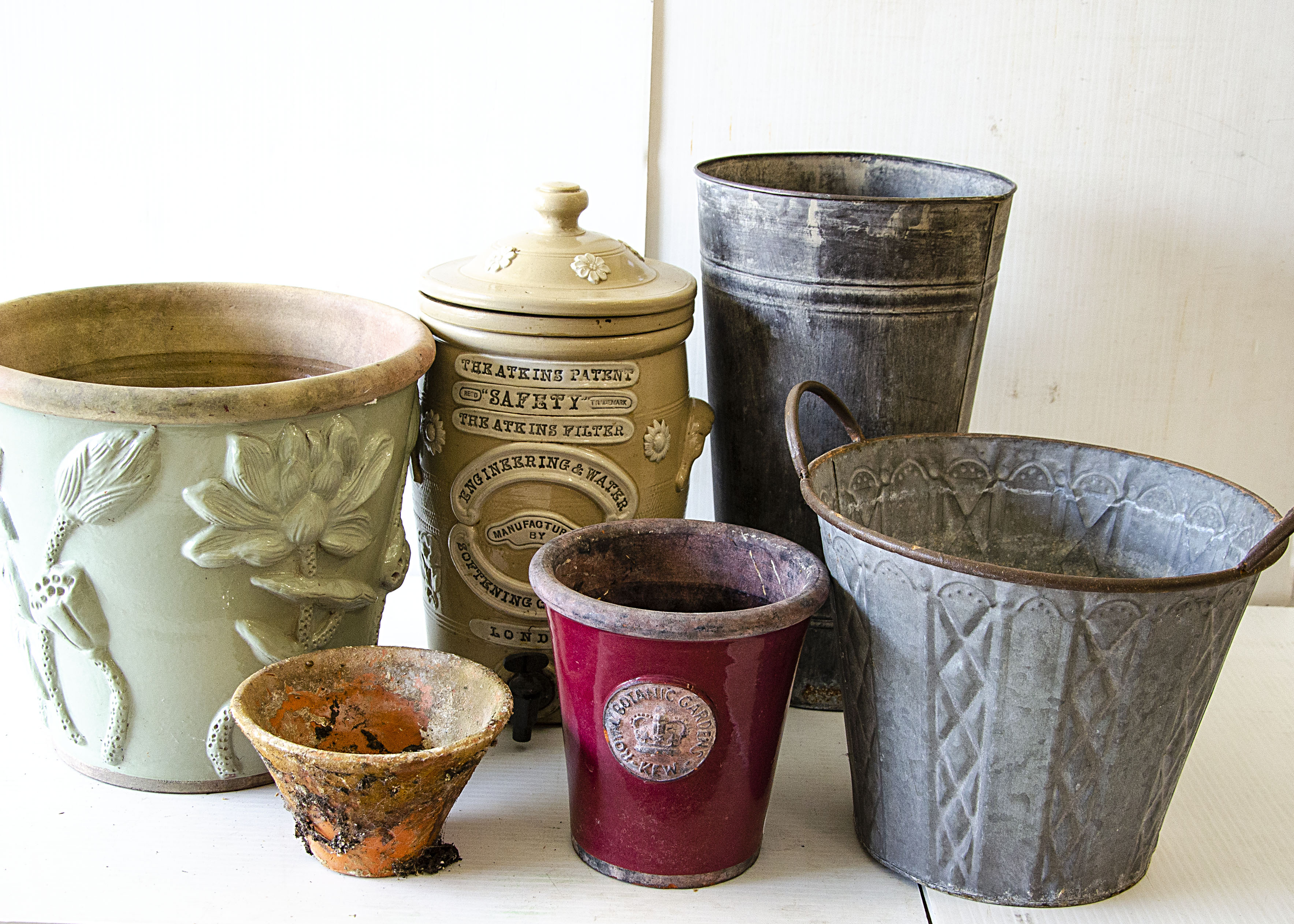 A collection of garden pots, including a spelter Art Nouveau style jardiniere, a twin handled Art - Image 4 of 4