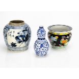 A large Chinese porcelain blue and white ginger jar, decorated with floral and exotic bird design,