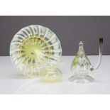 Three items of early 20th Century Vaseline glass, including a shallow sunken bowl with large