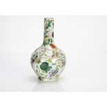 A Chinese famille verte Kangxi style bottle vase, the white ground with polychrome decoration of