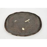 A Japanese Meiji period shibiyama tray, the hardwood carved tray with lotus flower and leaves