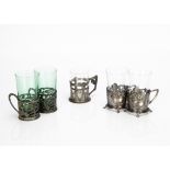 A pair of Orivit pewter Jugendstil glass or cup holders, decorated with pierced design of flower