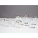 A part suite of early 20th Century iridescent glassware, the quatrefoil shaped glasses comprising