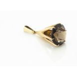 A modernist Finnish 14ct gold and smoky quartz stylised fob pendant, the conical setting