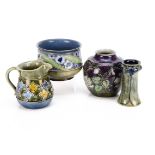 A small collection of Royal Doulton stoneware, in the Art Nouveau style including a jug with