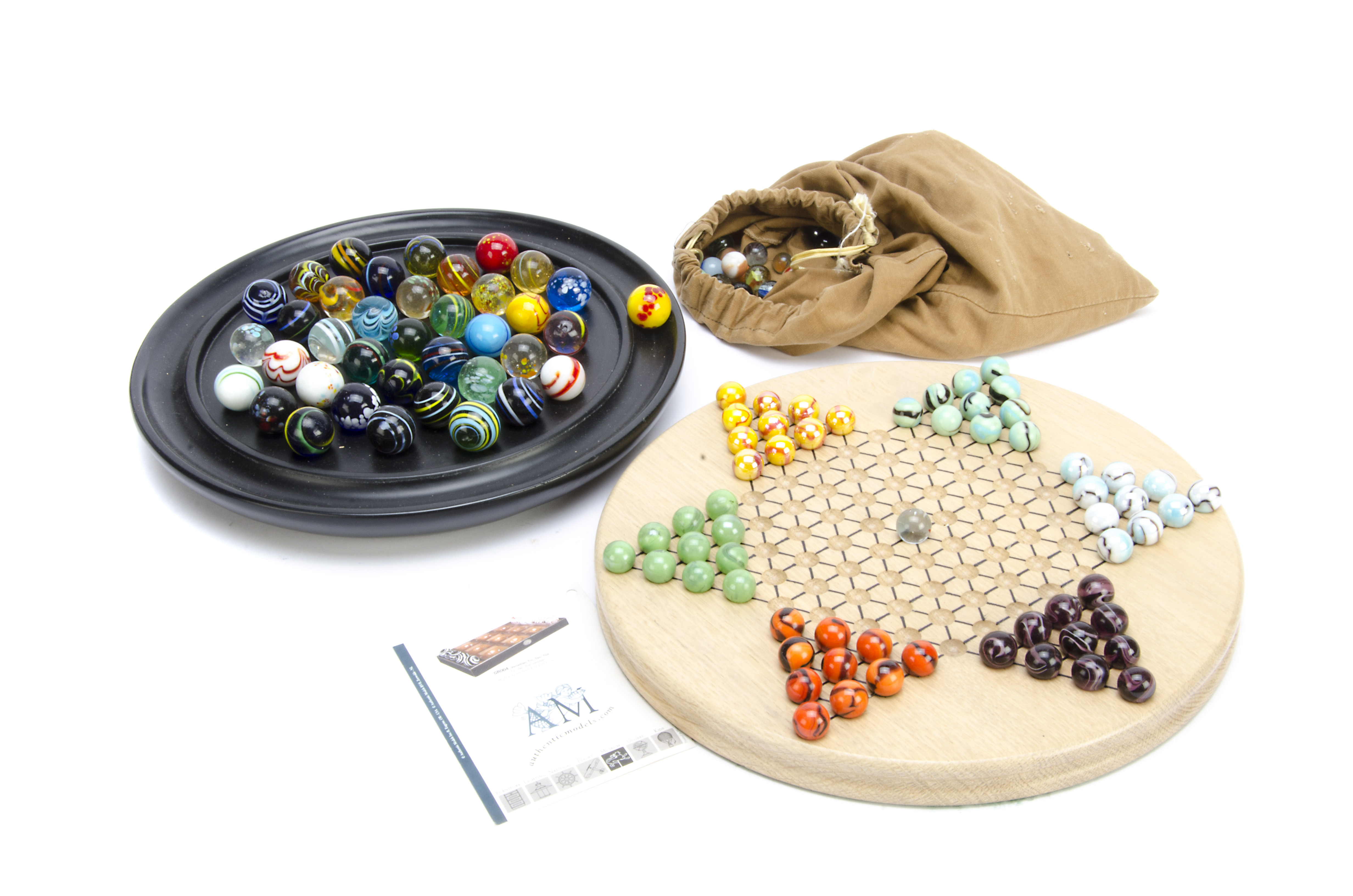 A contemporary oak star solitaire board, with coloured marbles, board 30cm, a contemporary German