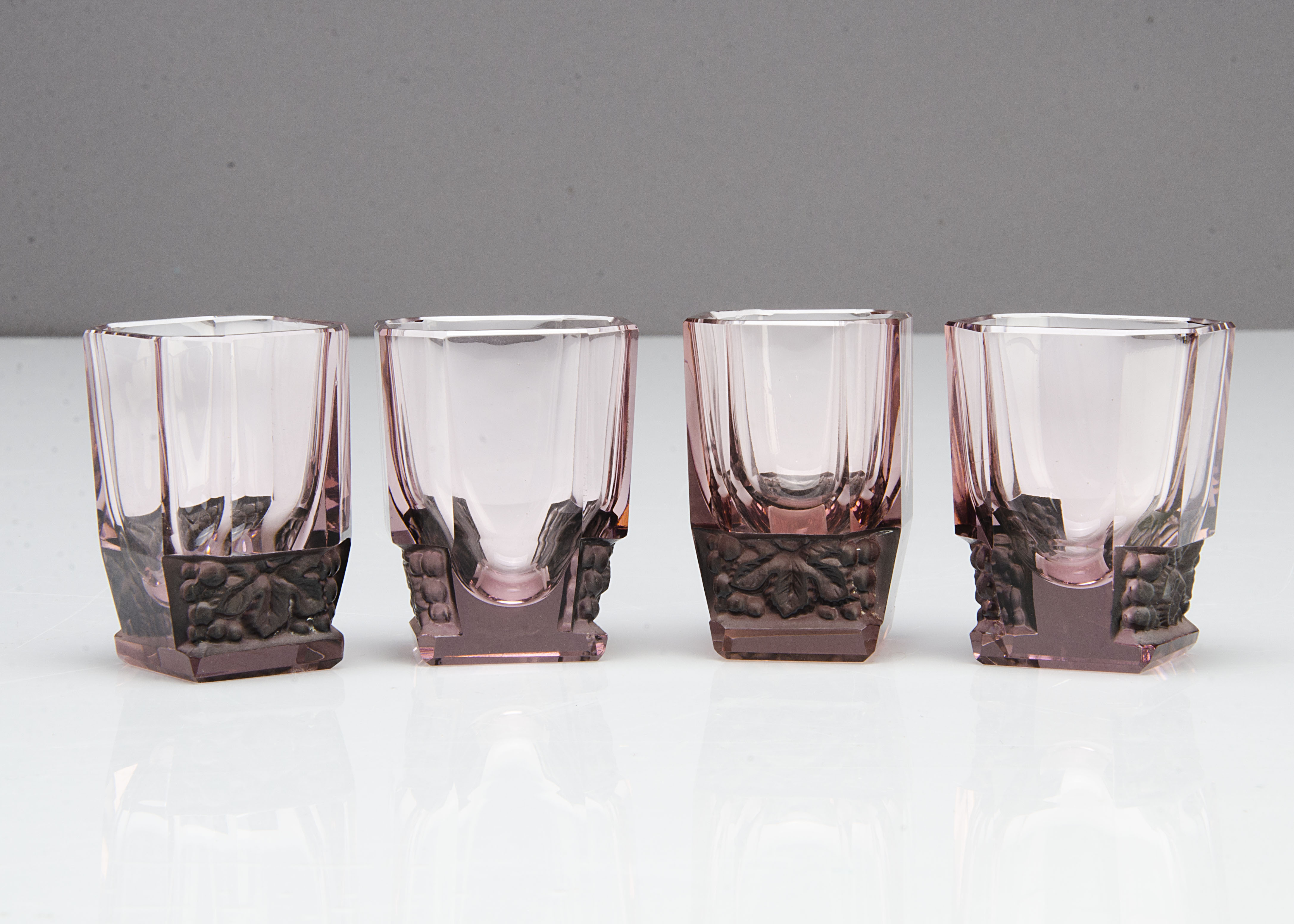 A set of four Art Deco amethyst heavy liquor glasses, of rectangular form with canted corners and - Image 2 of 2