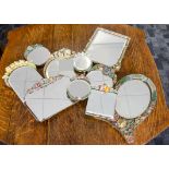 A collection of Art Deco floral Barbola dressing table mirrors, of various shapes and sizes,