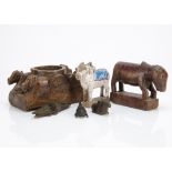 A group of Indian carvings to include Oxen, various multi-compartmental boxes and several brass cast