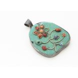 A turquoise, coral and lapis lazuli white metal pendant, of floral design, bale marked 925, 6.2cm