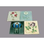 Four Henry Richards tube lined Art Nouveau tiles, all with stylised floral design, painted in