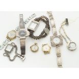 A collection of various ladies wristwatches, including a silver elliptical cased and strap