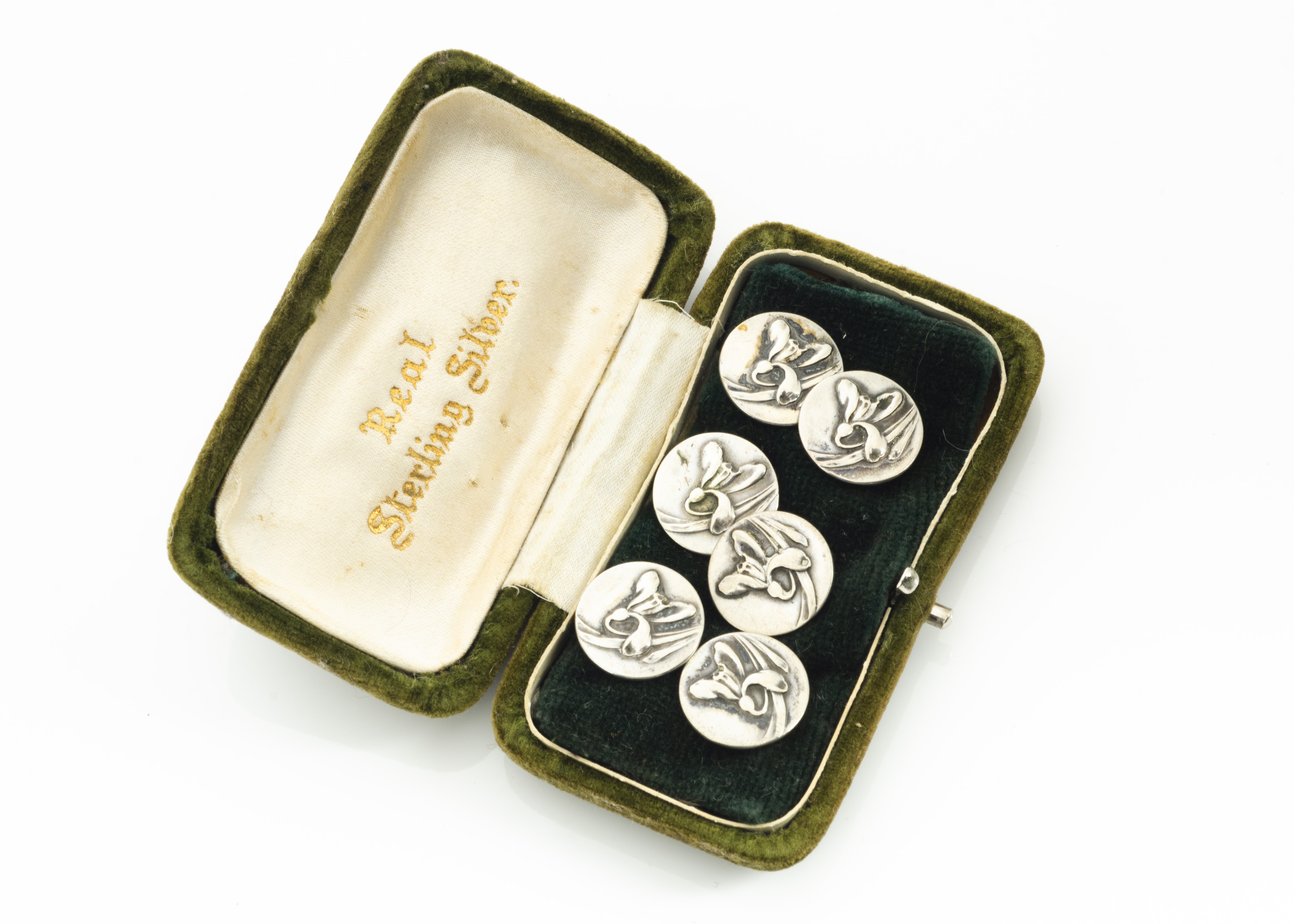 A set of six continental Art Nouveau white metal circular buttons, with stylised irises in relief - Image 2 of 2