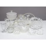 A collection of miscellaneous moulded and cut glassware, including an octagonal storage jar and lid,
