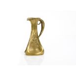 A French bronze Art Nouveau jug or pitcher, of triangular tapered form with the front two sides