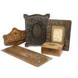 A collection of Art Nouveau carved wooden panels, pipe rack with painted floral design and oak