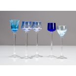 A pair of German Art Nouveau tulip shaped bowl liquor glasses, on colourless glass stems and