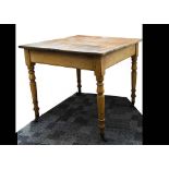 A small pine occasional table, the stripped pine top of two planks with revealed dowel decoration to