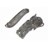 A continental Art Nouveau pewter desk inkstand and pen tray, of organic leaf and reed design base