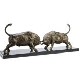 A contemporary bronze figure group, modelled as a pair of fighting horned bulls with tails raised on