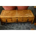 A contemporary elm Chinese occasional table, of rectangular form with three pull out drawers with