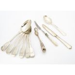 A set of six Victorian fiddle pattern dessert spoons, by George Adams, with engraved monogram,