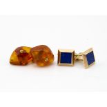 A pair of lapis lazuli and gold cufflinks, marked 9ct, the square ends with snap backs, in Charles