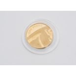 A modern Royal Mint gold 1 pence coin, dated 2008, from the Royal Shield of Arms series, proof like,