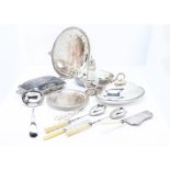 A collection of Victorian and later silver plated items, including three entrée dishes, a biscuit