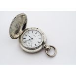 A large late 19th Century American silver full hunter pocket watch from Waltham, 60mm, appears to