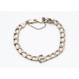 A lady's 9ct gold curb linked bracelet, with snap clasp, marked 9kt Italy and hallmarked, 21cm, 14.
