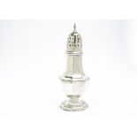 A large George V silver sugar sifter, 23cm high and 8.3ozt