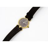 A c1980s Must de Cartier silver gilt quartz lady's wristwatch, 19mm circular case, brown dial with